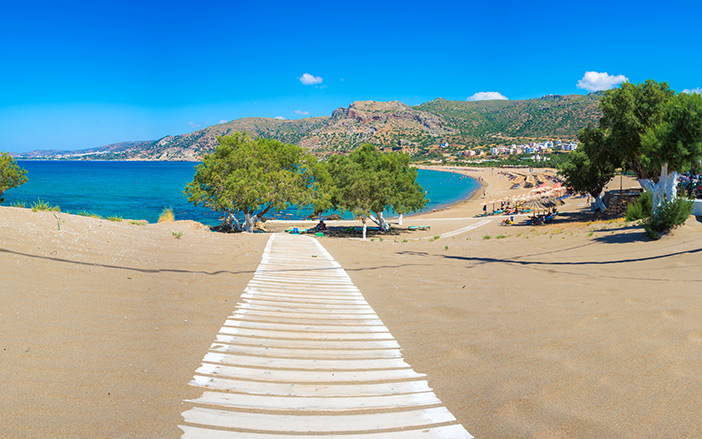 Sunbathe in Pachia Ammos Beach